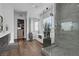 Elegant bathroom with a large walk-in shower and soaking tub at 11903 Sandstone Arch Dr, Las Vegas, NV 89138