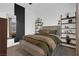 Serene bedroom with plush bedding and built-in shelving at 11903 Sandstone Arch Dr, Las Vegas, NV 89138