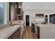 Spacious kitchen with dark cabinetry and quartz countertops at 11903 Sandstone Arch Dr, Las Vegas, NV 89138