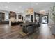 Modern kitchen featuring island, stainless steel appliances, and hardwood floors at 11903 Sandstone Arch Dr, Las Vegas, NV 89138