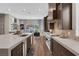 Modern kitchen with stainless steel appliances and an expansive island at 11903 Sandstone Arch Dr, Las Vegas, NV 89138