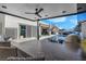 Outdoor kitchen with bar, grill, and views of the pool at 11903 Sandstone Arch Dr, Las Vegas, NV 89138