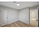 Spacious bedroom with light walls and wood-look floors at 1208 Marion Dr, Las Vegas, NV 89110