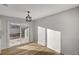 Light and bright dining area with vinyl flooring and sliding glass door to backyard at 1208 Marion Dr, Las Vegas, NV 89110