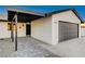 Modern single story home with covered entryway and new pavers at 1208 Marion Dr, Las Vegas, NV 89110