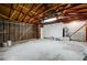 Unfinished garage with high ceilings and ample space for storage at 1208 Marion Dr, Las Vegas, NV 89110