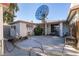 Large backyard patio with fire pit and satellite dish at 1229 S 9Th St, Las Vegas, NV 89104