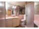 Pink bathroom with shower, toilet and vanity at 1229 S 9Th St, Las Vegas, NV 89104