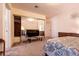 Bedroom with mirrored closet and TV at 1229 S 9Th St, Las Vegas, NV 89104