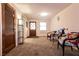 Bright entryway with wood door and seating area at 1229 S 9Th St, Las Vegas, NV 89104