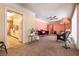 Living area with view into kitchen and peach walls at 1229 S 9Th St, Las Vegas, NV 89104