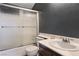 Small bathroom with shower/tub combo and vanity at 1608 Council Bluff Ln, North Las Vegas, NV 89031