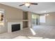 Spacious dining area with fireplace and sliding glass doors at 1608 Council Bluff Ln, North Las Vegas, NV 89031