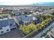 Aerial view of a house and surrounding neighborhood at 1610 Dire Wolf Avenue, North Las Vegas, NV 89084