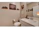 Charming powder room with modern fixtures and decor at 1610 Dire Wolf Avenue, North Las Vegas, NV 89084