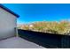 Private patio with mountain views and a black privacy screen at 1610 Dire Wolf Avenue, North Las Vegas, NV 89084