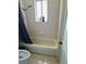 Simple bathroom with a bathtub and shower at 1695 Westwind Rd, Las Vegas, NV 89146