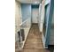 Clean and bright hallway with wood-look flooring at 1695 Westwind Rd, Las Vegas, NV 89146