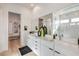 Modern bathroom with double vanity, frameless shower, and stylish decor at 210 Bella Noche St, Las Vegas, NV 89138