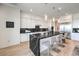 Stylish kitchen with marble countertops, modern cabinetry, and stainless steel appliances at 210 Bella Noche St, Las Vegas, NV 89138