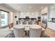 Elegant kitchen featuring a large island, modern cabinetry, and marble countertops at 210 Bella Noche St, Las Vegas, NV 89138