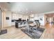 Contemporary kitchen with white cabinets, marble countertops and a large island at 210 Bella Noche St, Las Vegas, NV 89138