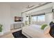 Luxurious main bedroom with a canopy bed, plenty of natural light and city view at 210 Bella Noche St, Las Vegas, NV 89138