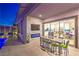 Modern patio with indoor-outdoor kitchen view at 210 Bella Noche St, Las Vegas, NV 89138