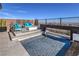 Stunning pool and spa with tiered patio and mountain views at 210 Bella Noche St, Las Vegas, NV 89138