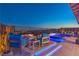 Night view of a luxurious pool and patio area at 210 Bella Noche St, Las Vegas, NV 89138