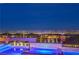 Night view of a luxurious pool and spa at 210 Bella Noche St, Las Vegas, NV 89138