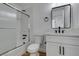 Updated bathroom with white vanity, modern fixtures, and a glass shower door at 2157 Wagonwheel Ave, Las Vegas, NV 89119