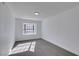 Spacious bedroom with bay window and grey carpet at 2157 Wagonwheel Ave, Las Vegas, NV 89119