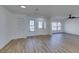 Bright and airy living room with hardwood floors and ceiling fan at 2157 Wagonwheel Ave, Las Vegas, NV 89119