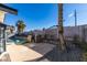 Backyard with kidney-shaped pool and patio area at 2157 Wagonwheel Ave, Las Vegas, NV 89119