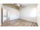 Bright bedroom with wood-look floors and ceiling fan at 2725 S Nellis Blvd # 2197, Las Vegas, NV 89121