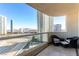 Spacious balcony with city views and comfortable seating at 2747 Paradise Rd # 1104, Las Vegas, NV 89109