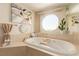 Bathroom with a large bathtub and city views at 2747 Paradise Rd # 1104, Las Vegas, NV 89109