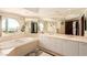 Elegant bathroom with double sinks and a large tub at 2747 Paradise Rd # 1104, Las Vegas, NV 89109