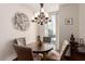 Charming dining area with a round table, four chairs, and city views at 2747 Paradise Rd # 1104, Las Vegas, NV 89109