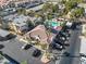 Aerial view of community with pool, parking, and building exteriors at 2801 N Rainbow Blvd # 235, Las Vegas, NV 89108