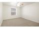 Spacious bedroom with ceiling fan and neutral carpeting at 2801 N Rainbow Blvd # 235, Las Vegas, NV 89108