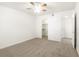 Bright bedroom with ceiling fan, carpet, and a large closet at 2801 N Rainbow Blvd # 235, Las Vegas, NV 89108