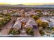 Stunning aerial view of a meticulously landscaped estate in a luxurious residential neighborhood at 3 Pine Hollow Dr, Henderson, NV 89052