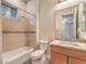 Bright bathroom with a shower-tub combo and modern fixtures at 3 Pine Hollow Dr, Henderson, NV 89052