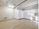 Spacious garage equipped with extensive storage cabinets and a convenient work area at 3 Pine Hollow Dr, Henderson, NV 89052
