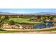 Picturesque golf course featuring lush green fairways, water hazards, and stunning mountain views in the background at 3 Pine Hollow Dr, Henderson, NV 89052