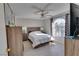 Bright bedroom with a queen-size bed and large window at 3125 N Buffalo Dr # 2120, Las Vegas, NV 89128