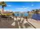 Scenic view of lake with residential buildings and lush greenery at 3125 N Buffalo Dr # 2120, Las Vegas, NV 89128