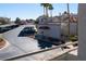 Exterior view of parking area, manicured landscape, and building features at 3125 N Buffalo Dr # 2120, Las Vegas, NV 89128